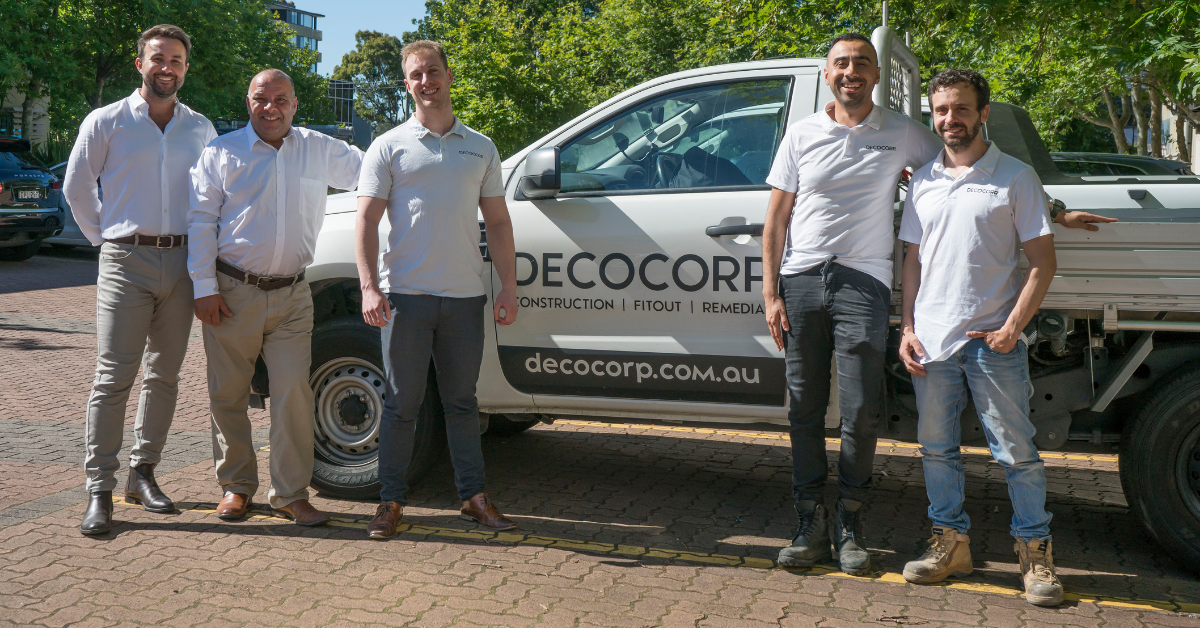 Decocorp Staff with the company owner